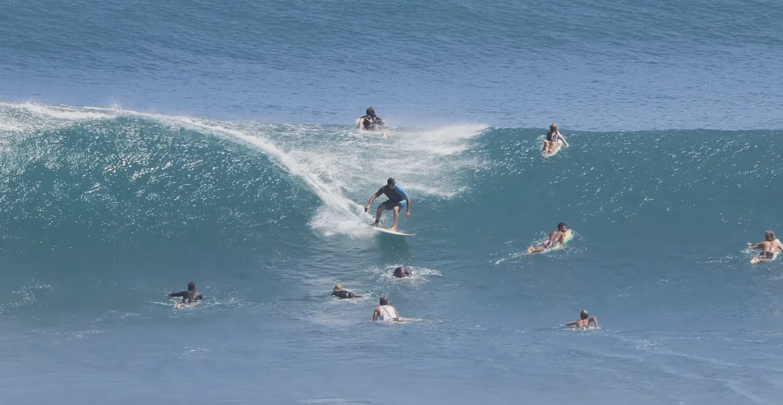 Surfer Dodges 25 Other Surfers In The Water While Riding A Wave