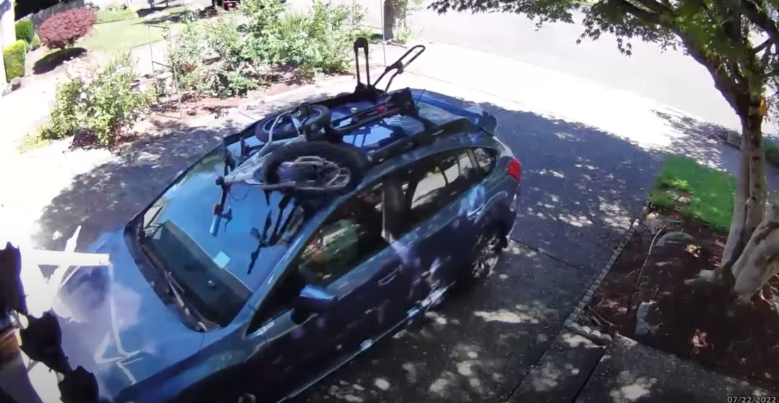 Womp Womp: Man With Bicycle On Top Of Car Tries Pulling Into Garage