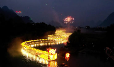 Beautiful Footage Of Chinese Dragon Boat Illuminated At Night
