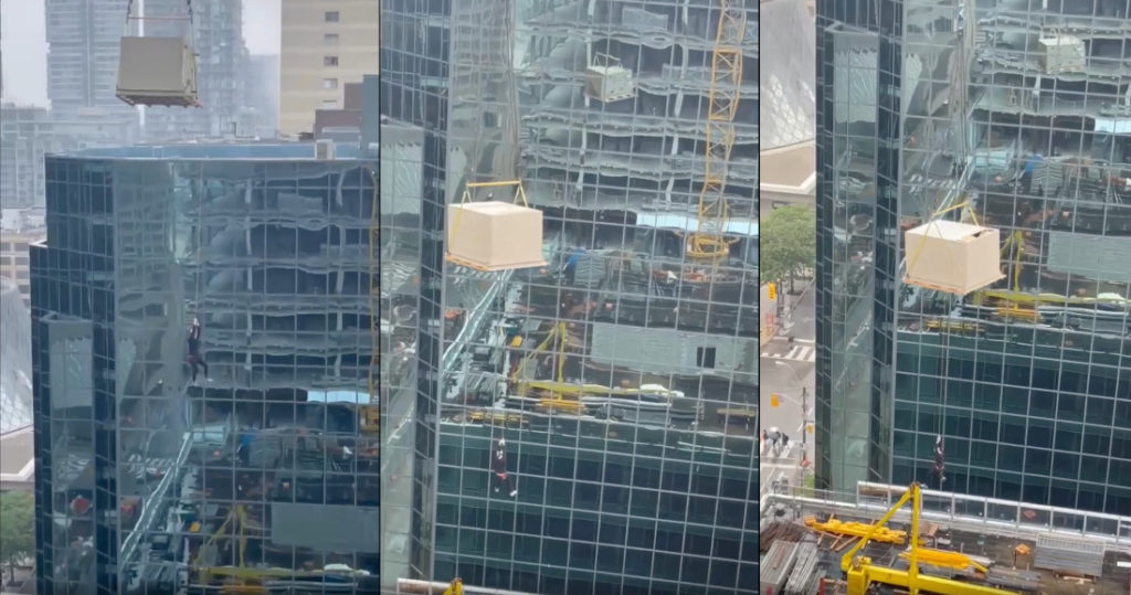 Yikes: Construction Worker Filmed Dangling From Crane