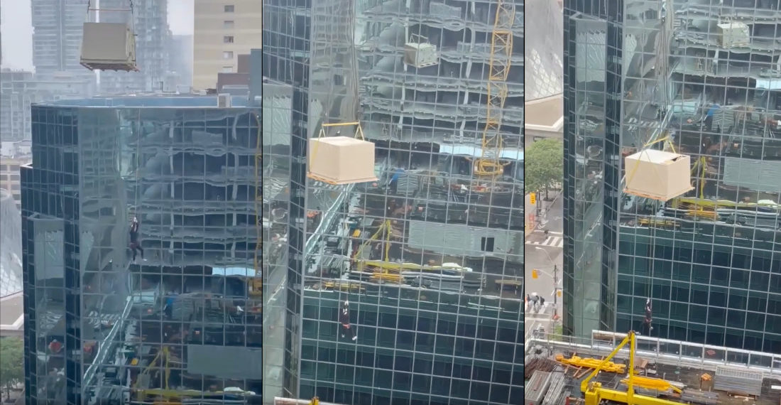 Yikes: Construction Worker Filmed Dangling From Crane