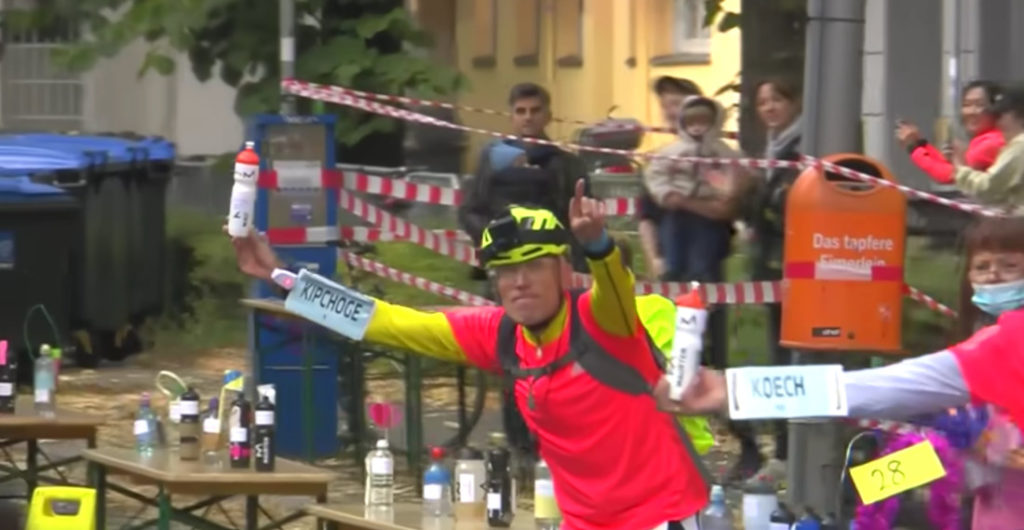 Highlight Reel Of Marathon Runner's Water Bottle Guy Doing His Thing