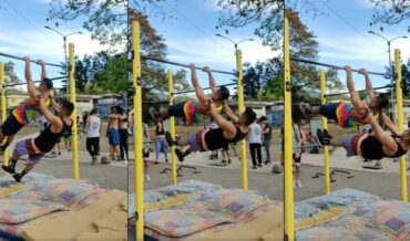 Two Dudes Demonstrate Incredible Strength With Horizontal Double Hanging Walk