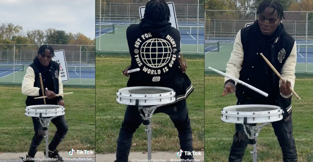 Incredible Drummer Performs While Dancing And Doing Stick Tricks