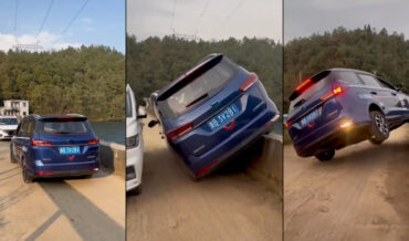 Two Drivers Pass On A Narrow Bridge