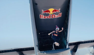 Skateboarder Rail Grinds Out The Back Of A Flying Plane