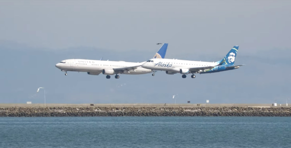 Passenger Planes Landing In Parallel At San Francisco Airport