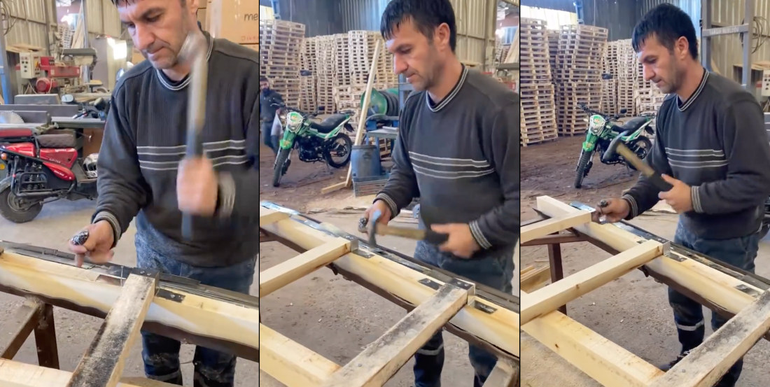 Pro Nailer Demonstrates His Skills While Constructing Wooden Frame