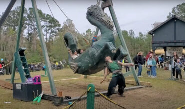 Dragon Tamer Performs Tricks With Dragon Swing At Renaissance fair