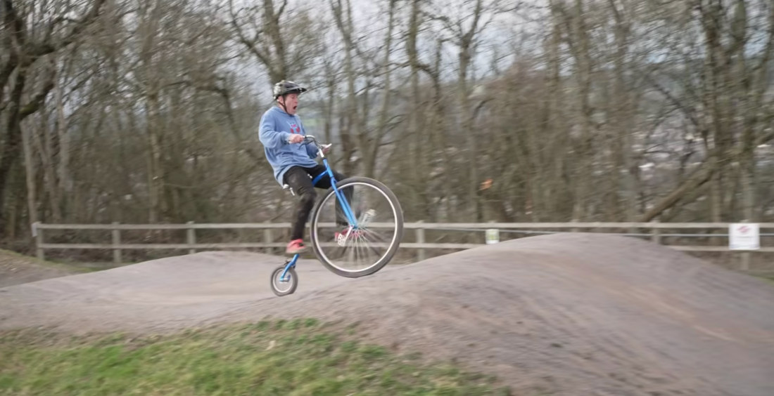 Guy Rides Penny Farthing Bike On Downhill Trail, BMX Track