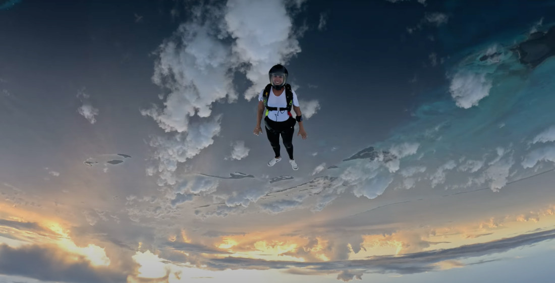 Woman Tries To Remain As Motionless As Possible While Skydiving