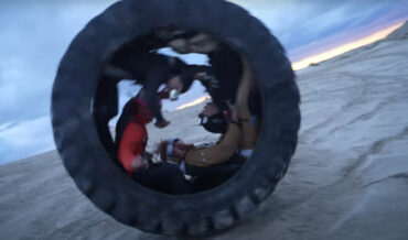Four People Ride Down Hill Inside A 7-Foot Tire