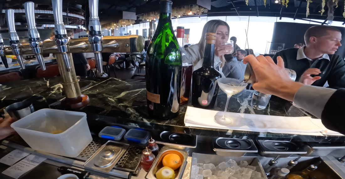 GoPro POV Footage Of Bartenders Serving Drinks During Busy Lunch
