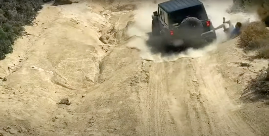 Copilot Leaps Out Of Jeep As Soon As It Slips Backwards While Offroading