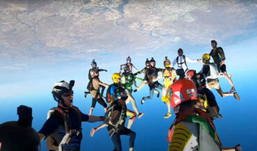 What Are You, Sky Line Dancing?: Skydiving Crew All Hold Hands