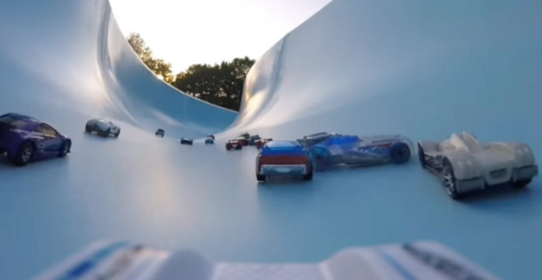Hot Wheels Races Down A Closed Water Slide