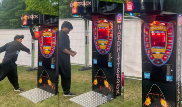 Man Attempting To Hit Punching Bag Game Breaks Phone