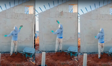 Construction Worker Casually Tosses Cement Onto High Wall Like A Total Pro