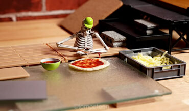 Stop Motion Video Of Legless Skeleton Making A Pizza