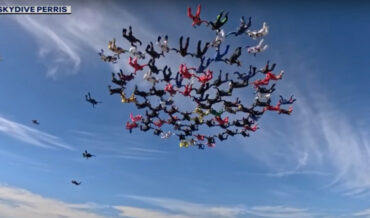 101 Skydivers Over 60 Link Together To Form Giant Snowflake Formation