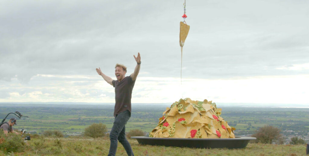 Doritos Uses Helicopter To Perform A 49-Foot Stretchy Cheese Pull