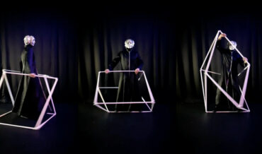 Trippy 4-Faced Artist Performs With Morphing Cube Prop