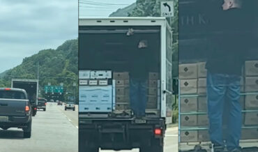 Guys Realize Man They Think Is Hanging On The Back Of Box Truck Is Just A Graphic