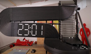 Giant Clock Tells Time With Dot Matrix Of Marbles