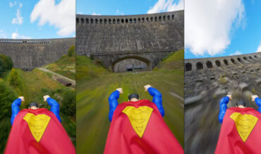 Ride Atop Superman’s Back For Flight Up Dam, Along Train Tracks