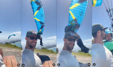 Paraglider Makes Insanely Impressive Landing Next To Friend Waiting On Bench
