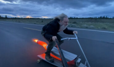 Crazy Rocketman Riding His Rocket-Powered Skateboard