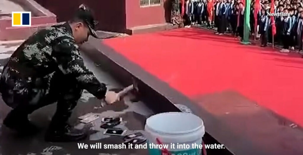 School In China Smashes Phones In Front Of Kids To Warn Against Use On Campus