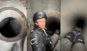 Man Sitting On Skateboard Takes Thrill Ride Through Steep Drain Pipe