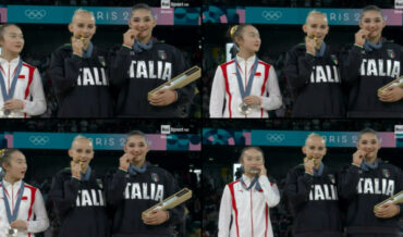 Chinese Gymnast Joins In Medal-Biting Celebration On Podium