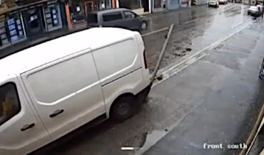 The End Life Cycle Of A Street Sign As Captured By Security Cam