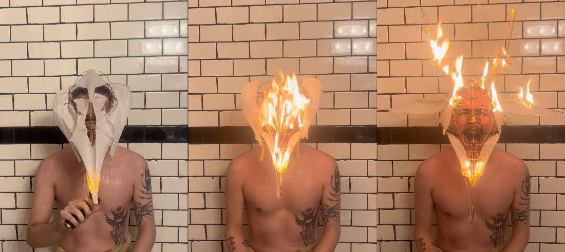 Artist Wearing Paper Mask Sets It On Fire In Bathtub