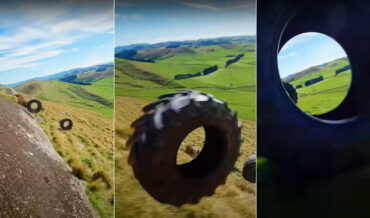 Flying A Drone Through A Tractor Tire Rolling Down A Hill