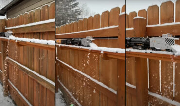 Backyard Model Train With Snowplow Doing Its Thing