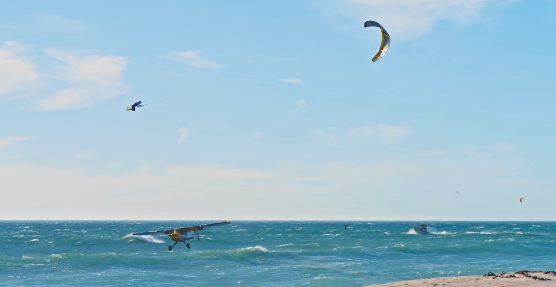 Kiteboard Jump Over A Flying Plane