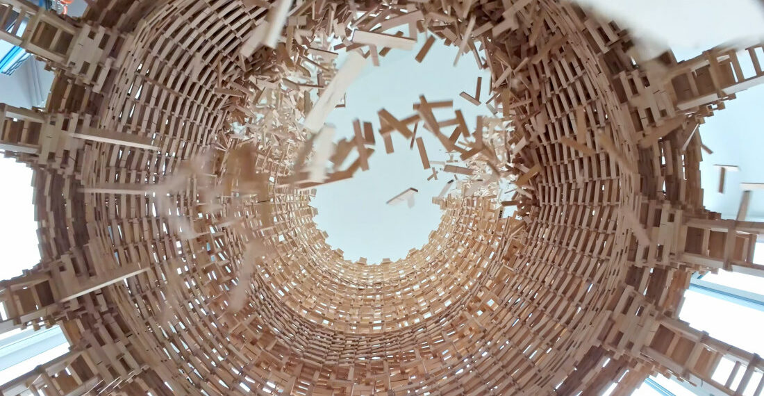 Watch An 18,000 Block Wooden Block Tower Collapse From The Inside
