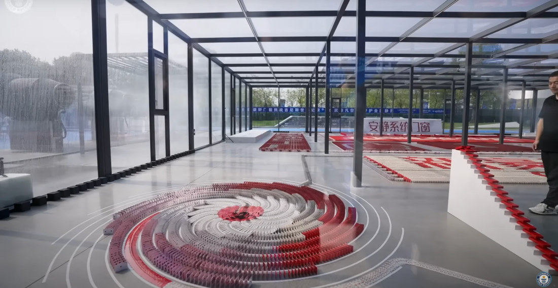 World Record For Most Playing Cards Knocked Over Like Dominos