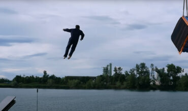 Human Dart Launches Himself Into Velcro Target Over Water