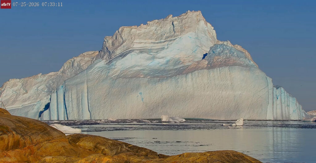 Gigantic Iceberg Hits Shore Of Greenland, Flips Over