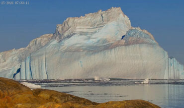 Gigantic Iceberg Hits Shore Of Greenland, Flips Over