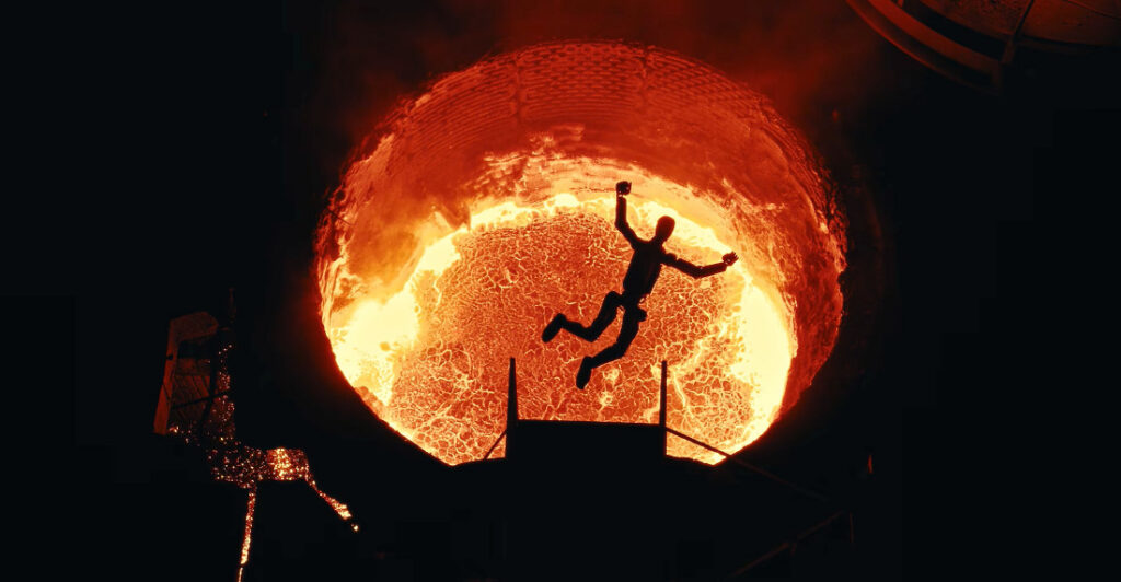 Humanoid Robots Diving Into Vat Of Molten Steel